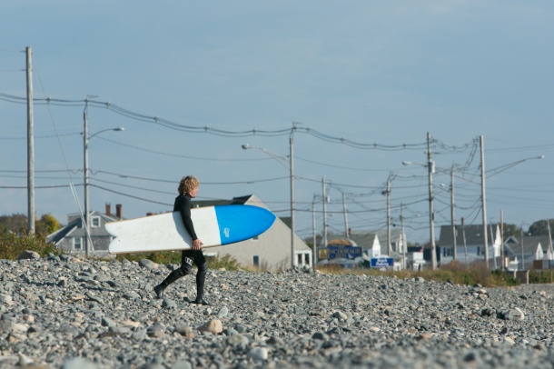 JON WEGENER FINLESS SURFBOARD AT THE BEACH